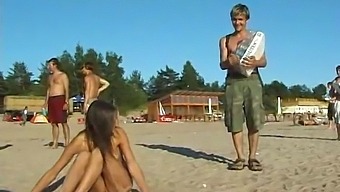 Teen Girl Enjoys Nude Play At The Beach